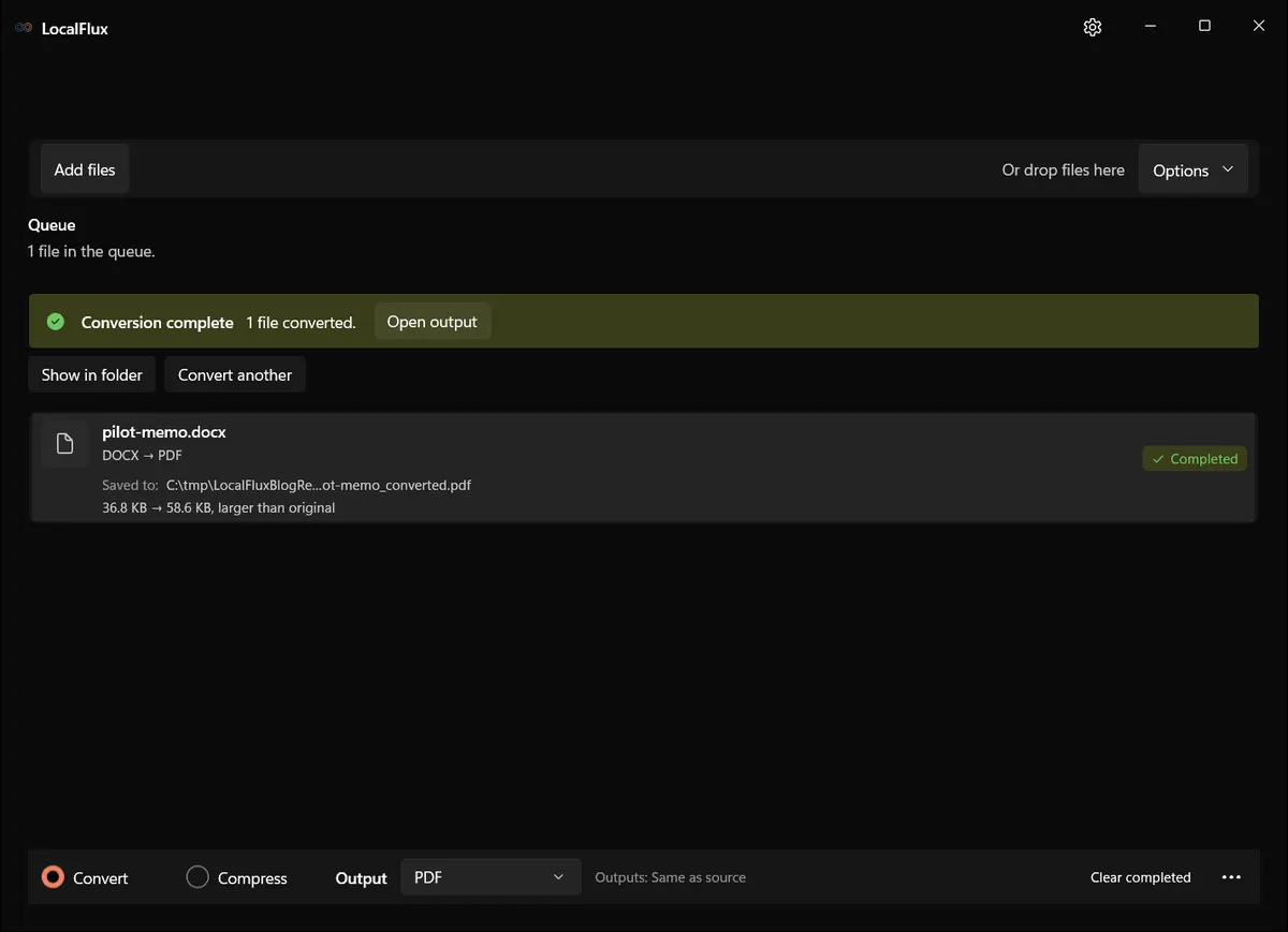 LocalFlux showing a completed local conversion of a synthetic business document on Windows.