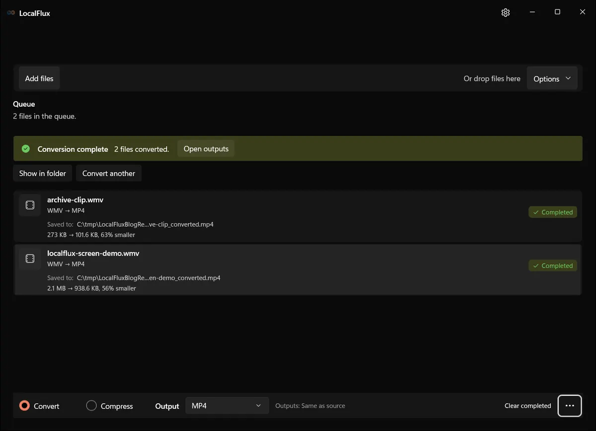 LocalFlux showing two completed WMV-to-MP4 conversions in a neutral C tmp folder.
